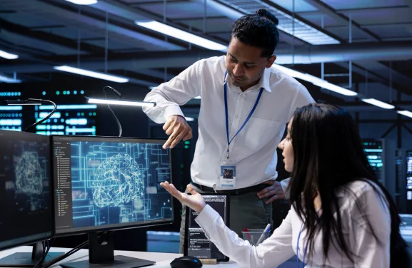 teamworking-colleagues-in-data-center-using-pc-to-2024-09-13-22-01-37-utc